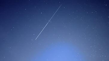  Meteor trail in the night sky 