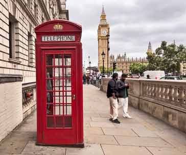 Red telephone call box near Houses of Parliament, London